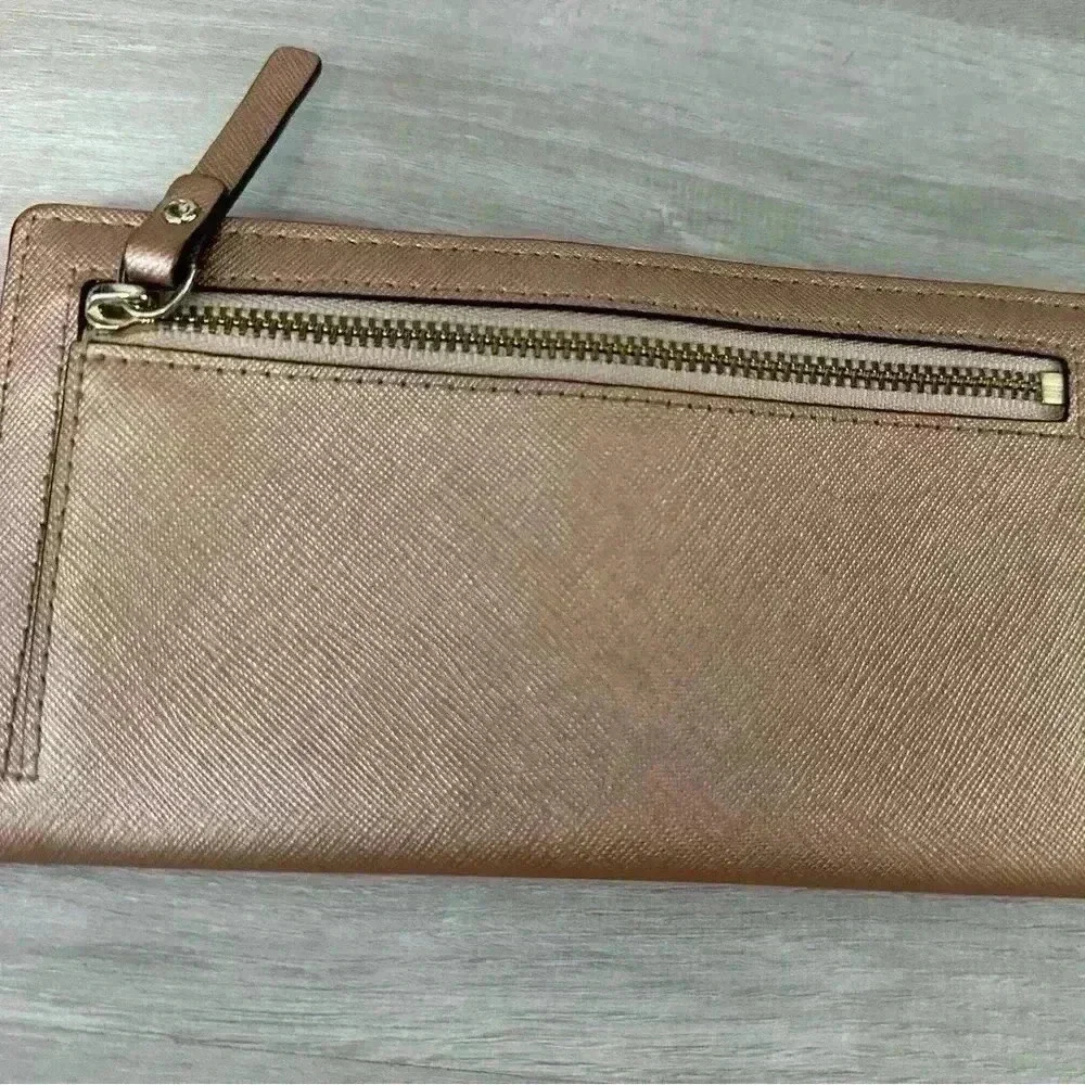 Kate Spade Rose gold wallet